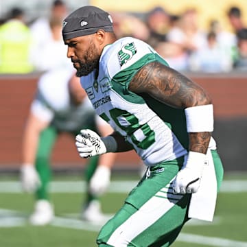 Jun 16, 2024; Hamilton, Ontario, CAN; Saskatchewan Rough Riders offensive lineman Justin Herdman Reed (58) warms up against the Hamilton Tiger Cats at Tim Hortons Field. Mandatory Credit: Gerry Angus-Imagn Images