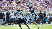 Sep 27, 2025; Manhattan, Kansas, USA; Kansas State Wildcats quarterback Avery Johnson (2) makes a pass while being chased by UCF Knights linebacker Lewis Carter (20) during the second quarter at Bill Snyder Family Football Stadium. Mandatory Credit: Scott Sewell-Imagn Images