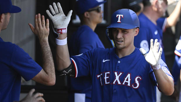 Texas Rangers' Corey Seager became the first left-handed hitting shortstop to reach 200 homers in MLB history on Thursday.