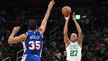 Oct 12, 2024; Boston, Massachusetts, USA; Boston Celtics guard Jordan Walsh (27) attempts a basket against Philadelphia 76ers forward Isaiah Mobley (35) during the second half at the TD Garden. Mandatory Credit: Brian Fluharty-Imagn Images