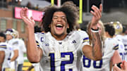 Washington Huskies wide receiver Denzel Boston celebrates after the Huskies' comeback victory over the Maryland Terrapins.