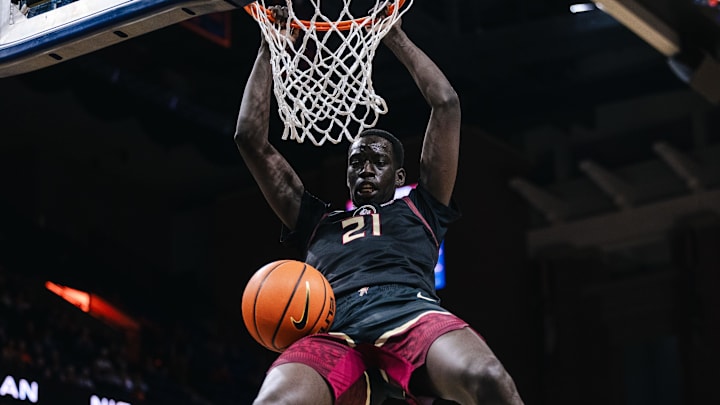 Mar 4, 2025; Charlottesville, Virginia, USA; Florida State Seminoles forward Alier Maluk (21) dunks the ball in the first half against the Virginia Cavaliers at John Paul Jones Arena. Mandatory Credit: Emily Faith Morgan-Imagn Images