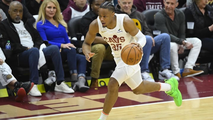 Apr 20, 2024; Cleveland, Ohio, USA; Cleveland Cavaliers forward Isaac Okoro (35) brings the ball up court in the fourth quarter against the Orlando Magic during game one of the first round for the 2024 NBA playoffs at Rocket Mortgage FieldHouse. Mandatory Credit: David Richard-Imagn Images