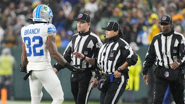 Detroit Lions defensive back Brian Branch (32) talks with officials after being ejected from a game.