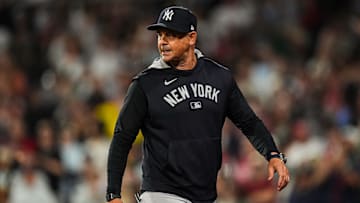 Jun 13, 2025; Boston, Massachusetts, USA; New York Yankees manager Aaron Boone (17) has words with the officials as they take on the Boston Red Sox in the tenth inning at Fenway Park. Mandatory Credit: David Butler II-Imagn Images