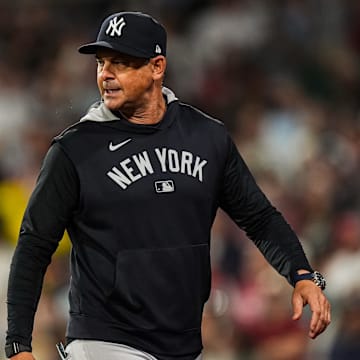 Jun 13, 2025; Boston, Massachusetts, USA; New York Yankees manager Aaron Boone (17) has words with the officials as they take on the Boston Red Sox in the tenth inning at Fenway Park. Mandatory Credit: David Butler II-Imagn Images