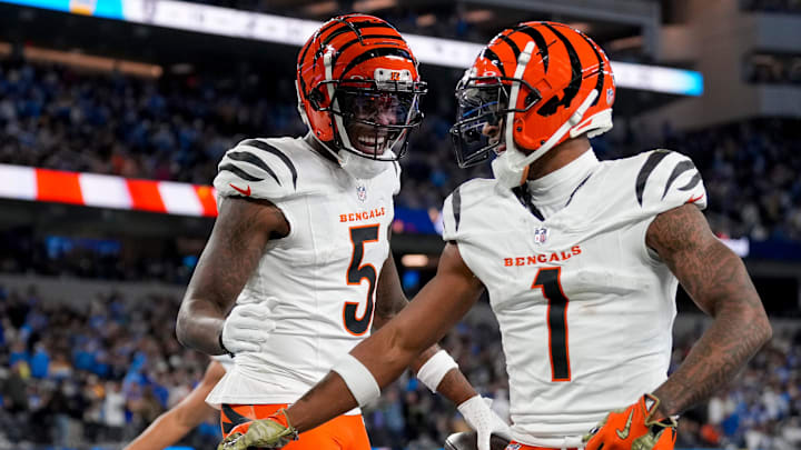Cincinnati Bengals wide receiver Tee Higgins (5) and Cincinnati Bengals wide receiver Ja'Marr Chase (1) celebrate a Higgins touchdown in the third quarter of the NFL Week 11 game between the Los Angeles Chargers and the Cincinnati Bengals at SoFi Stadium in Inglewood, Calif., on Sunday, Nov. 17, 2024. The Chargers won 34-27.