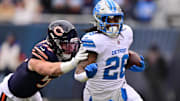 Jack Sanborn attempts to drag down Detroit's Jahmyr Gibbs last season at Soldier Field. Sanborn could be a Cowboys starter.