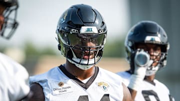 Jacksonville Jaguars defensive end Josh Hines-Allen (41) talks to a teammate while runing through drills during the seventh organized team activity at the Miller Electric Center in Jacksonville, Fla. Monday, June 2, 2025. [Doug Engle/Florida Times-Union]