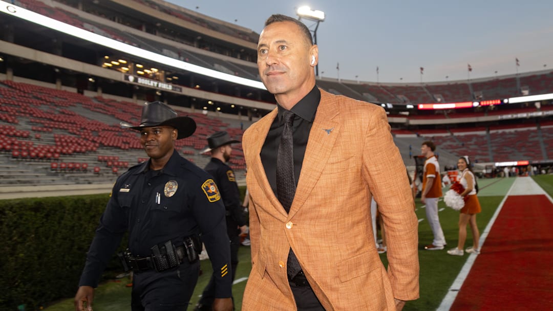 Nov 15, 2025; Athens, Georgia, USA; Texas Longhorns head coach Steve Sarkisian walks into Sanford Stadium before a game against the Georgia Bulldogs. Mandatory Credit: Brett Davis-Imagn Images