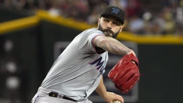 May 26, 2024; Phoenix, Arizona, USA; Miami Marlins pitcher Tanner Scott (66) throws against the Arizona Diamondbacks in the ninth inning at Chase Field. Mandatory Credit: Rick Scuteri-USA TODAY Sports