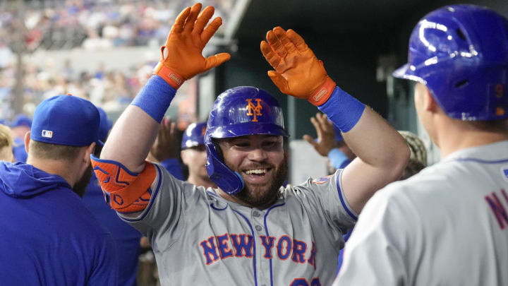 Jun 17, 2024; Arlington, Texas, USA; New York Mets right fielder DJ Stewart (29) celebrates his three-run home run with teammates in the dugout during the second inning against the Texas Rangers at Globe Life Field.