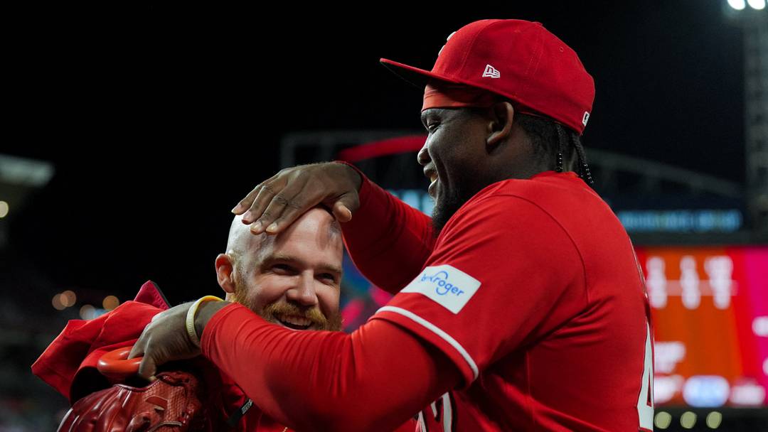 Jun 2, 2026; Cincinnati, Ohio, USA; Cincinnati Reds outfielder Blake Dunn, left, celebrates hitting a walk-off single with pitcher Luis Mey, right, after the game against the Kansas City Royals at Great American Ball Park. Mandatory Credit: Aaron Doster-Imagn Images Jun 2, 2026; Cincinnati, Ohio, USA; Cincinnati Reds outfielder Blake Dunn, left, celebrates hitting a walk-off single with pitcher Luis Mey, right, after the game against the Kansas City Royals at Great American Ball Park. Mandatory Credit: Aaron Doster-Imagn Images