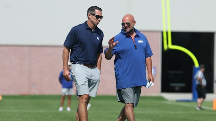 Jul 23, 2025; East Rutherford, NJ, USA; New York Giants general manager Joe Schoen and head coach Brian Daboll talk during training camp at Quest Diagnostics Training Center. Mandatory Credit: Vincent Carchietta-Imagn Images