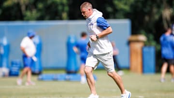 Florida Gators head coach Billy Napier runs during fall football practice at Heavener Football Complex at the University of Florida in Gainesville, FL on Tuesday, August 12, 2025. [Matt Pendleton/Gainesville Sun]