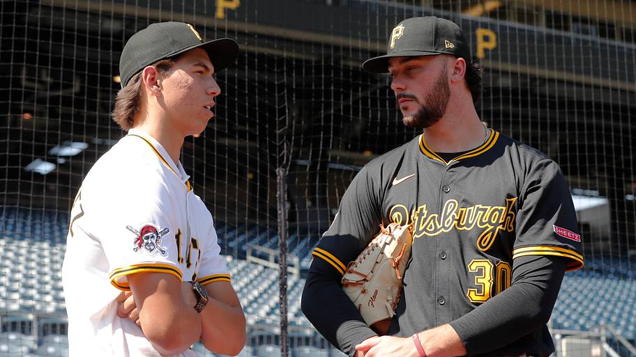 Seth Hernandez (left) talks with Pirates pitcher Paul Skenes in July 2025