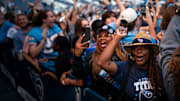 Fans cheer as during the Tennessee Titans select Miami Hurricanes quarterback Cam Ward with the first overall pick during the Titans NFL Draft Watch Party.