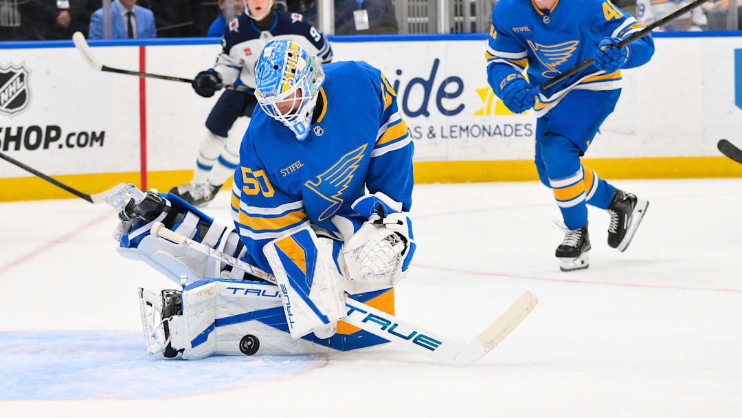 Apr 9, 2026; St. Louis, Missouri, USA; St. Louis Blues goaltender Jordan Binnington (50) defends the net against the Winnipeg Jets during the first period at Enterprise Center. Mandatory Credit: Jeff Curry-Imagn Images