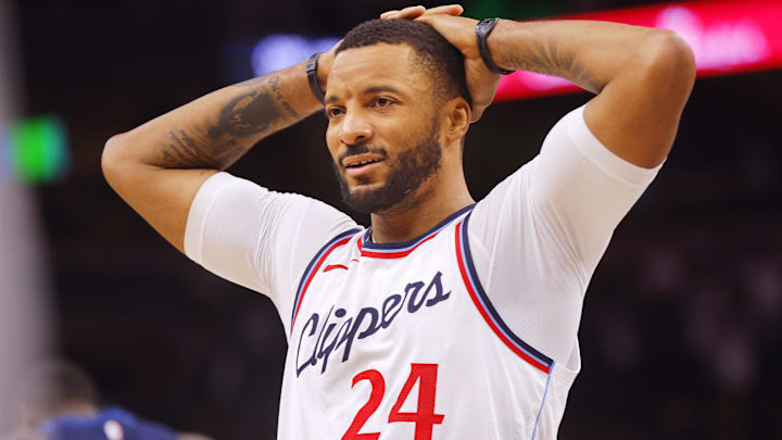 Jan 6, 2025; Minneapolis, Minnesota, USA; Los Angeles Clippers guard Norman Powell (24) reacts as time ends and his team loses to the Minnesota Timberwolves at Target Center. Mandatory Credit: Bruce Kluckhohn-Imagn Images