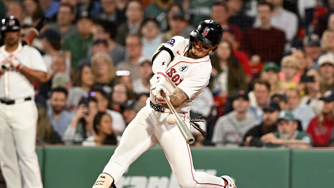 Jun 2, 2025; Boston, Massachusetts, USA; Boston Red Sox outfielder Jarren Duran (16) hits a double against the Los Angeles Angels during the fifth inning at Fenway Park.