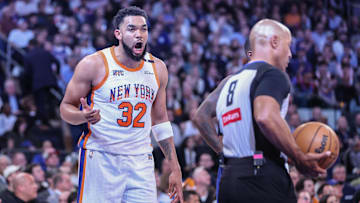 Apr 29, 2025; New York, New York, USA; New York Knicks center Karl-Anthony Towns (32) argues with an official in the fourth quarter against the Detroit Pistons during game five of first round for the 2025 NBA Playoffs at Madison Square Garden. Mandatory Credit: Wendell Cruz-Imagn Images