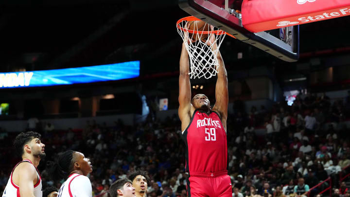 Jul 14, 2024; Las Vegas, NV, USA; Houston Rockets center Orlando Robinson (59) dunks against the Washington Wizards during the fourth quarter at Thomas & Mack Center. Mandatory Credit: Stephen R. Sylvanie-USA TODAY Sports