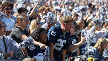 Penn State Nittany Lions football fans cheer during a game at Beaver Stadium.