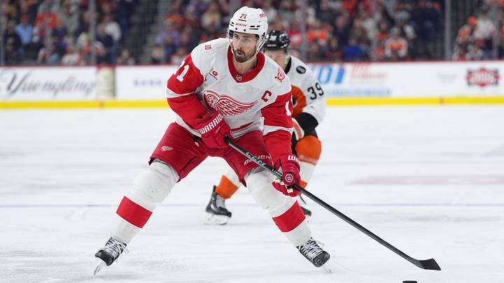 Apr 2, 2026; Philadelphia, Pennsylvania, USA; Detroit Red Wings center Dylan Larkin (71) controls the puck against the Philadelphia Flyers in the first period at Xfinity Mobile Arena. Mandatory Credit: Kyle Ross-Imagn Images
