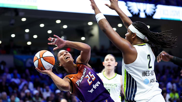 Jul 3, 2025; Arlington, Texas, USA;  Phoenix Mercury forward Alyssa Thomas (25) shoots as Dallas Wings forward Myisha Hines-Allen (2) defends during the second half at College Park Center. Mandatory Credit: Kevin Jairaj-Imagn Images