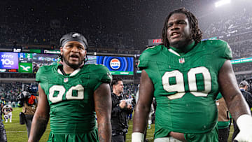 Nov 26, 2023; Philadelphia, Pennsylvania, USA; Philadelphia Eagles defensive tackle Jordan Davis (90) and defensive tackle Jalen Carter (98) walk off the field after a victory against the Buffalo Bills at Lincoln Financial Field. Mandatory Credit: Bill Streicher-Imagn Images