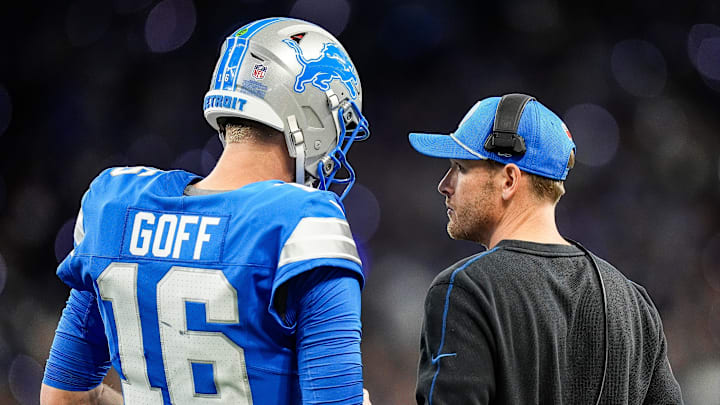 Detroit Lions quarterback Jared Goff and offensive coordinator Ben Johnson talk on the sidelines. Detroit Lions quarterback Jared Goff and offensive coordinator Ben Johnson talk on the sidelines.