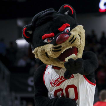 Jan 20, 2024; Cincinnati, Ohio, USA; The Cincinnati Bearcats mascot points during the first half in the game against the Oklahoma Sooners at Fifth Third Arena. Mandatory Credit: Katie Stratman-USA TODAY Sports