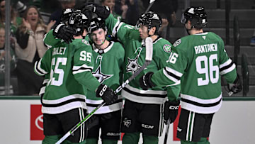 Mar 18, 2025; Dallas, Texas, USA; Dallas Stars center Roope Hintz (24) and defenseman Thomas Harley (55) and center Wyatt Johnston (53) and left wing Jason Robertson (21) and right wing Mikko Rantanen (96) celebrates a power play goal scored by Johnston against the Anaheim Ducks during the first period at the American Airlines Center. Mandatory Credit: Jerome Miron-Imagn Images