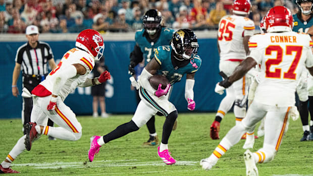 Jacksonville Jaguars wide receiver Travis Hunter (12) scrambles for yards in the fourth quarter during a Monday Night NFL foo