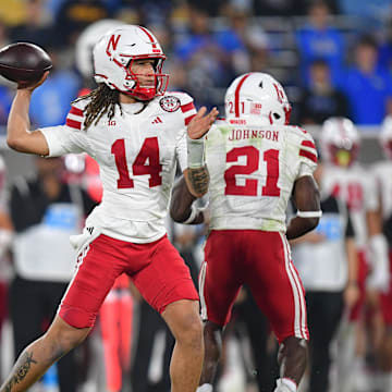 Nov 8, 2025; Pasadena, California, USA; Nebraska Cornhuskers quarterback TJ Lateef (14) throws against the UCLA Bruins during the first half at the Rose Bowl.