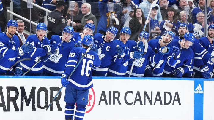 Apr 27, 2024; Toronto, Ontario, CAN; Toronto Maple Leafs right wing Mitch Marner (16) celebrates at the bench after scoring a goal against the Boston Bruins during the third period in game four of the first round of the 2024 Stanley Cup Playoffs at Scotiabank Arena. Mandatory Credit: Nick Turchiaro-USA TODAY 