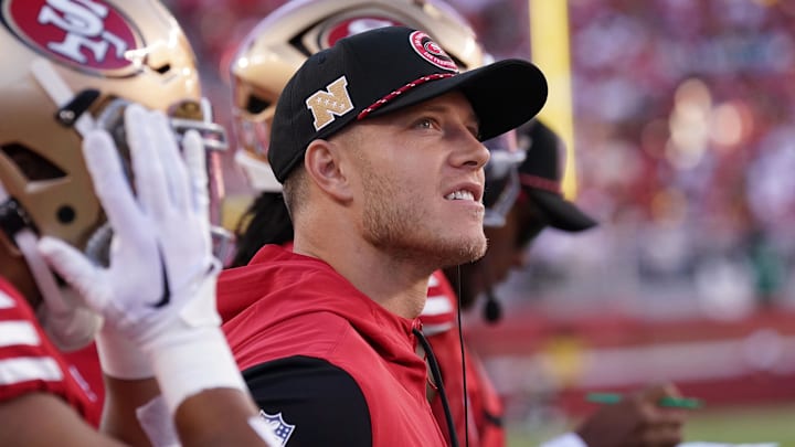 Sep 9, 2024; Santa Clara, California, USA; San Francisco 49ers running back Christian McCaffrey (23) watches from the sideline due to injury during the second quarter against the New York Jets at Levi's Stadium. Mandatory Credit: David Gonzales-Imagn Images