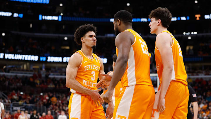 Mar 27, 2026; Chicago, IL, USA; Tennessee Volunteers guard Bishop Boswell (3) celebrates with forward Jaylen Carey (23) and J.P. Estrella (13) in the second half against the Iowa State Cyclones during a Sweet Sixteen game of the Midwest Regional of the men's 2026 NCAA Tournament at United Center. Mandatory Credit: Kamil Krzaczynski-Imagn Images