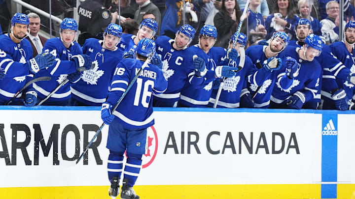 Apr 27, 2024; Toronto, Ontario, CAN; Toronto Maple Leafs right wing Mitch Marner (16) celebrates at the bench after scoring a goal against the Boston Bruins during the third period in game four of the first round of the 2024 Stanley Cup Playoffs at Scotiabank Arena. Mandatory Credit: Nick Turchiaro-USA TODAY 
