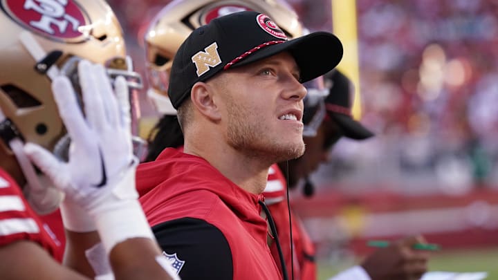 Sep 9, 2024; Santa Clara, California, USA; San Francisco 49ers running back Christian McCaffrey (23) watches from the sideline due to injury during the second quarter against the New York Jets at Levi's Stadium. Mandatory Credit: David Gonzales-Imagn Images