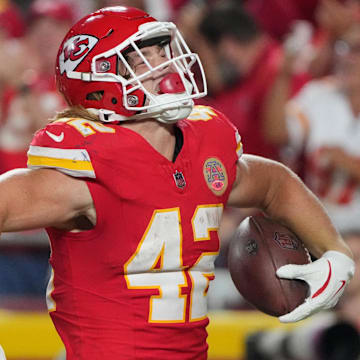 Aug 22, 2024; Kansas City, Missouri, USA; Kansas City Chiefs running back Carson Steele (42) celebrates after scoring against the Chicago Bears during the first half at GEHA Field at Arrowhead Stadium. Mandatory Credit: Denny Medley-Imagn Images