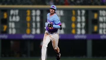 Colorado Rockies left fielder Jordan Beck (27) rounds the bases on a solo home run in the eighth inning against the Cincinnati Reds at Coors Field on April 25.