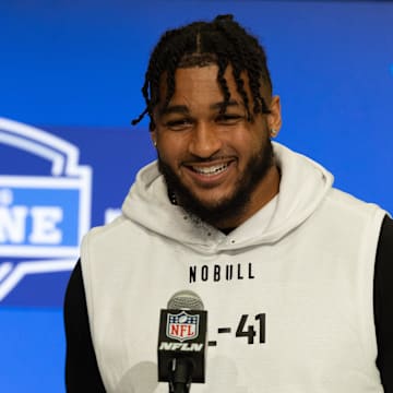 Western Michigan defensive lineman Marshawn Kneeland talks to the media at the 2024 NFL Combine 