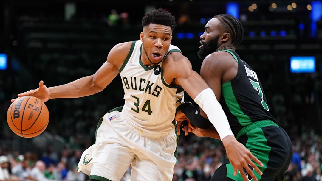 May 1, 2022; Boston, Massachusetts, USA; Milwaukee Bucks forward Giannis Antetokounmpo (34) drives the ball against Boston Celtics guard Jaylen Brown (7) in the second half during game one of the second round for the 2022 NBA playoffs at TD Garden. Mandatory Credit: David Butler II-Imagn Images