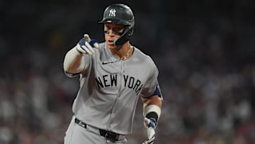  New York Yankees outfielder Aaron Judge reacts to the crowd after hitting a home run against the Boston Red Sox in the ninth inning at Fenway Park. 