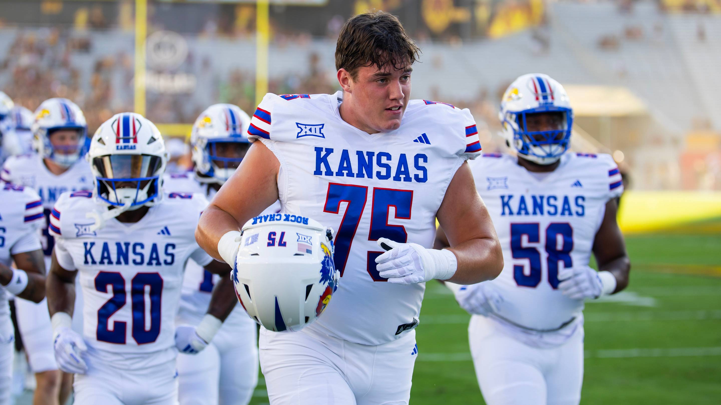 Oct 5, 2024; Tempe, Arizona, USA; Kansas Jayhawks offensive lineman Calvin Clements (75) against the Arizona State Sun Devils at Mountain America Stadium. Mandatory Credit: Mark J. Rebilas-Imagn Images | USA TODAY Sports via Reuters Connect
