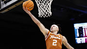 Mar 19, 2025; Dayton, OH, USA; Texas Longhorns guard Chendall Weaver (2) shoots the ball in the first half against the Xavier Musketeers at UD Arena. Mandatory Credit: Rick Osentoski-Imagn Images