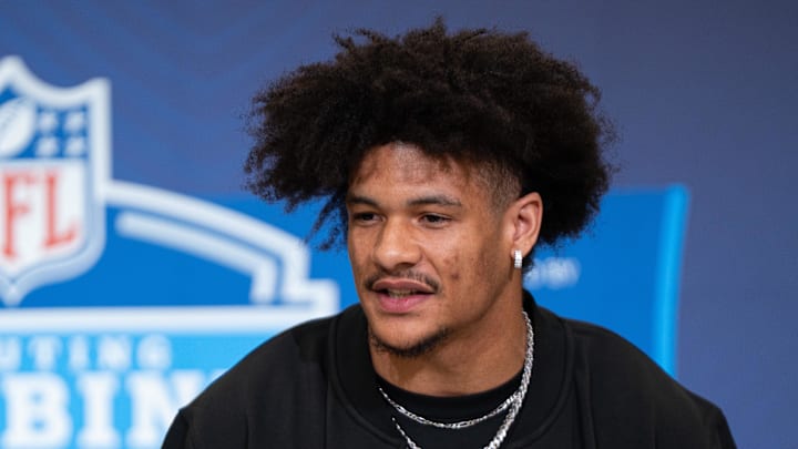 Feb 27, 2026; Indianapolis, IN, USA; Washington wideout Denzel Boston (WO08) speaks to members of the media during the NFL Combine at the Indiana Convention Center. Mandatory Credit: Jacob Musselman-Imagn Images