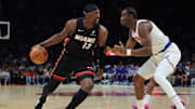 Oct 26, 2025; Miami, Florida, USA; Miami Heat center Bam Adebayo (13) drives to the basket against New York Knicks center Ariel Hukporti (55) during the first quarter at Kaseya Center. Mandatory Credit: Sam Navarro-Imagn Images
