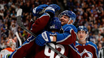 Nov 11, 2025; Denver, Colorado, USA; Colorado Avalanche left wing Gabriel Landeskog (92) celebrates his goal with right wing Valeri Nichushkin (13) in the second period against the Anaheim Ducks at Ball Arena. Mandatory Credit: Isaiah J. Downing-Imagn Images